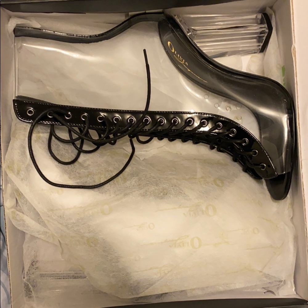 Clear wide heeled peep toe bootie. From PLT